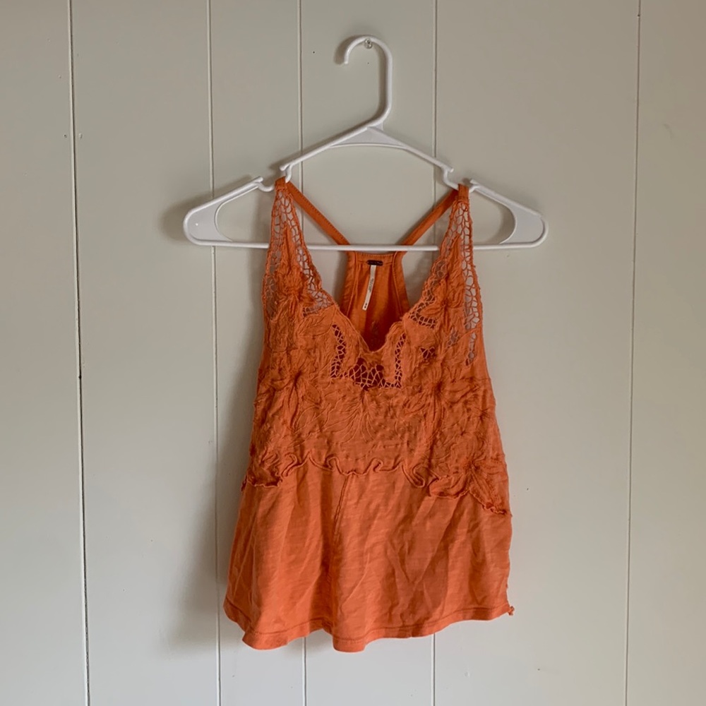 Free people size medium orange tank top with flower lace detail